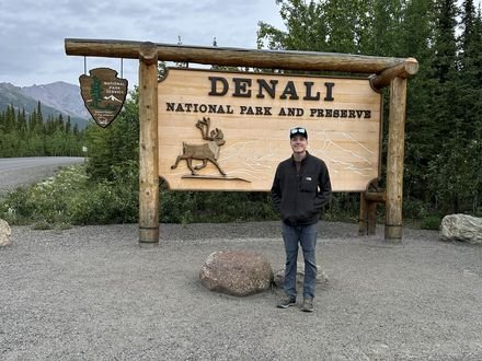 Adam at the Denali National Park and Preserve entrance sign
