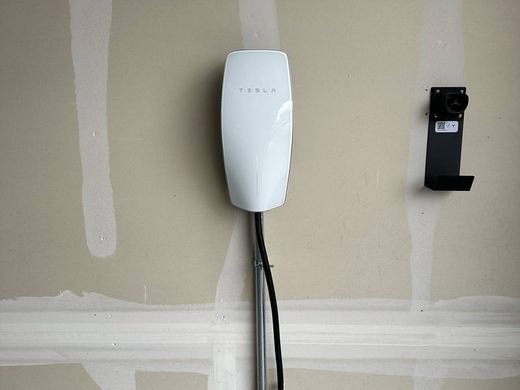 Tesla Wall Connector hardwired on a garage wall